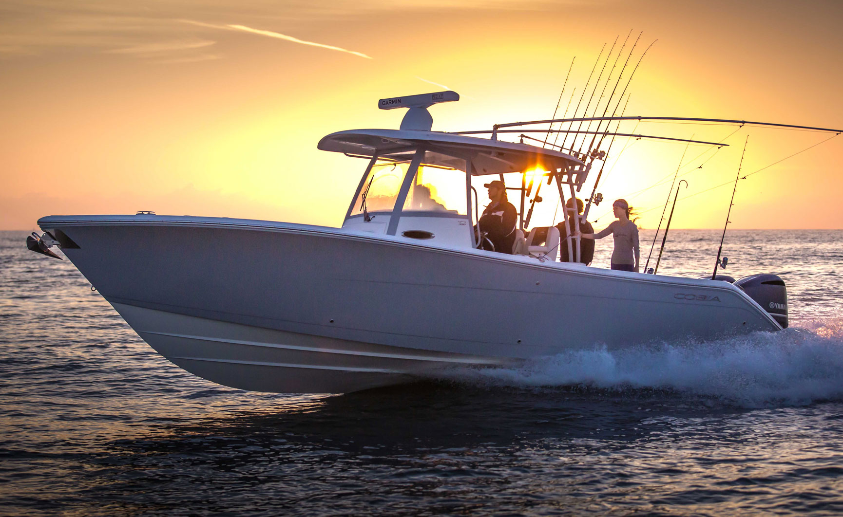 320 CC boat in sunset